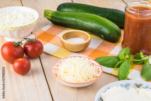 Zucchini rollups with cheese in marinara sauce. photo