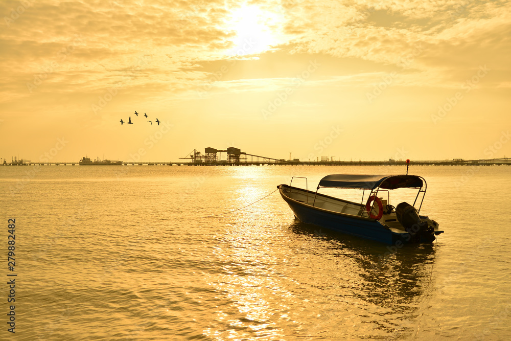Fisherman boat with sunset background Fisherman boat with sunset background