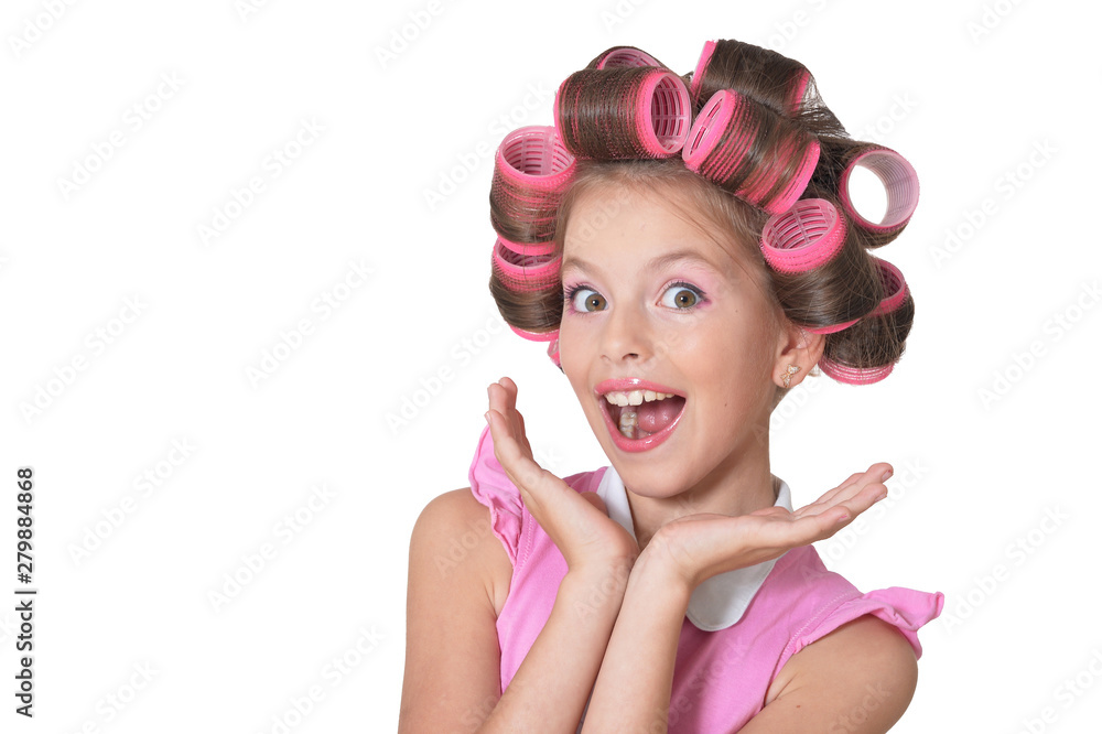 portrait of emotional little pretty girl with hair curlers posing portrait of emotional little pretty girl with hair curlers posing