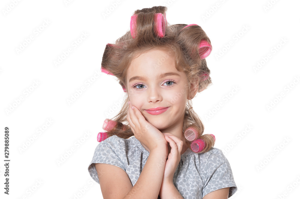 portrait of emotional little pretty girl with hair curlers portrait of emotional little pretty girl with hair curlers