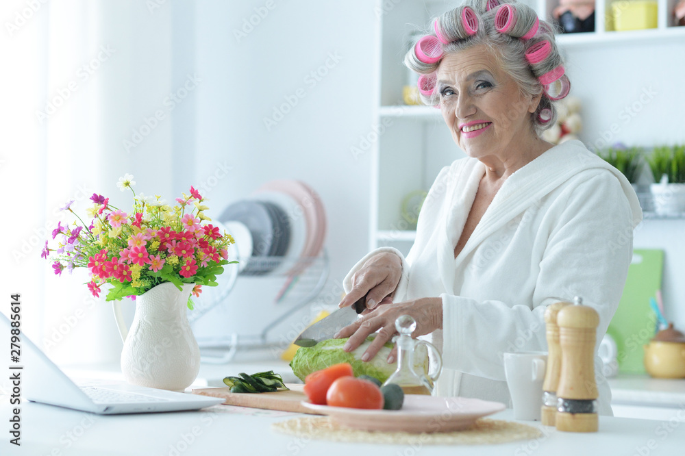 Portrait of senior woman in hair rollers Portrait of senior woman in hair rollers
