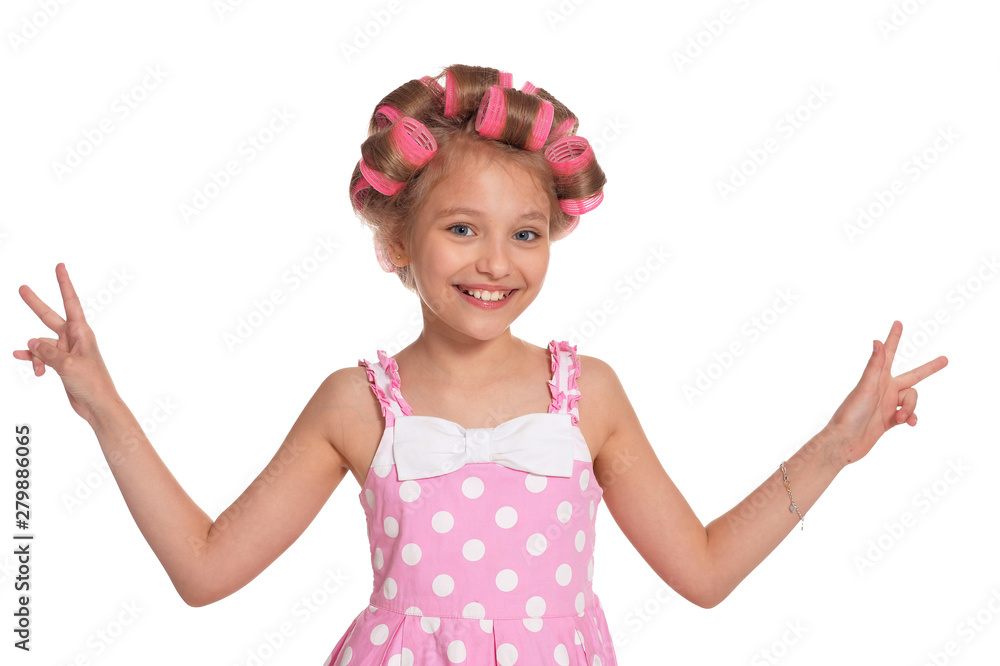 portrait of emotional little pretty girl with hair curlers - obrazy, fototapety, plakaty 