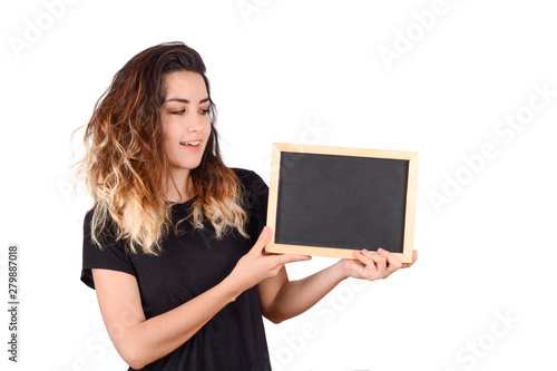 woman holding a chalkboard
