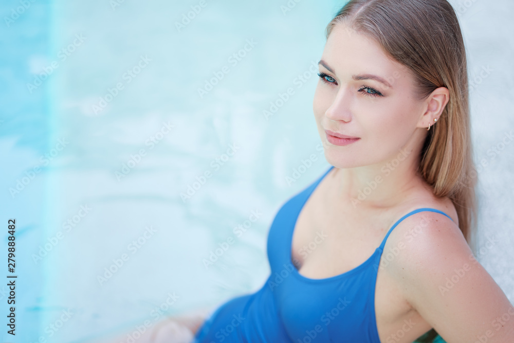 Enjoying vacation. Beautiful young woman in swimming pool. Enjoying vacation. Beautiful young woman in swimming pool.