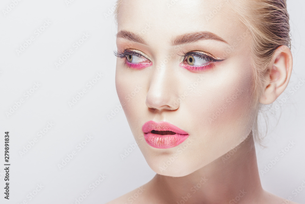 Portrait of beautiful woman with make up, studio shoot Portrait of beautiful woman with make up, studio shoot