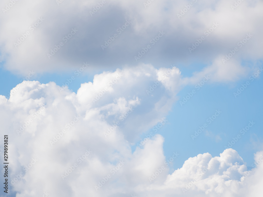 Blue sky with beautiful cumulus clouds. Sunny weather before the rain. Blue sky with beautiful cumulus clouds. Sunny weather before the rain.