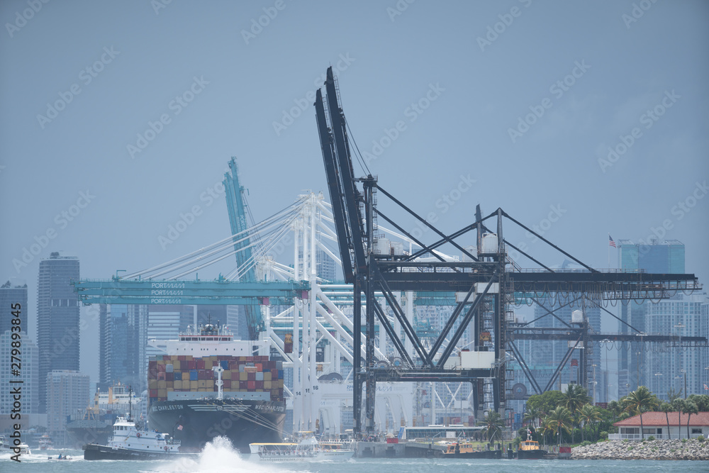 Telephoto shot Port of Miami Florida with cargo ship loading