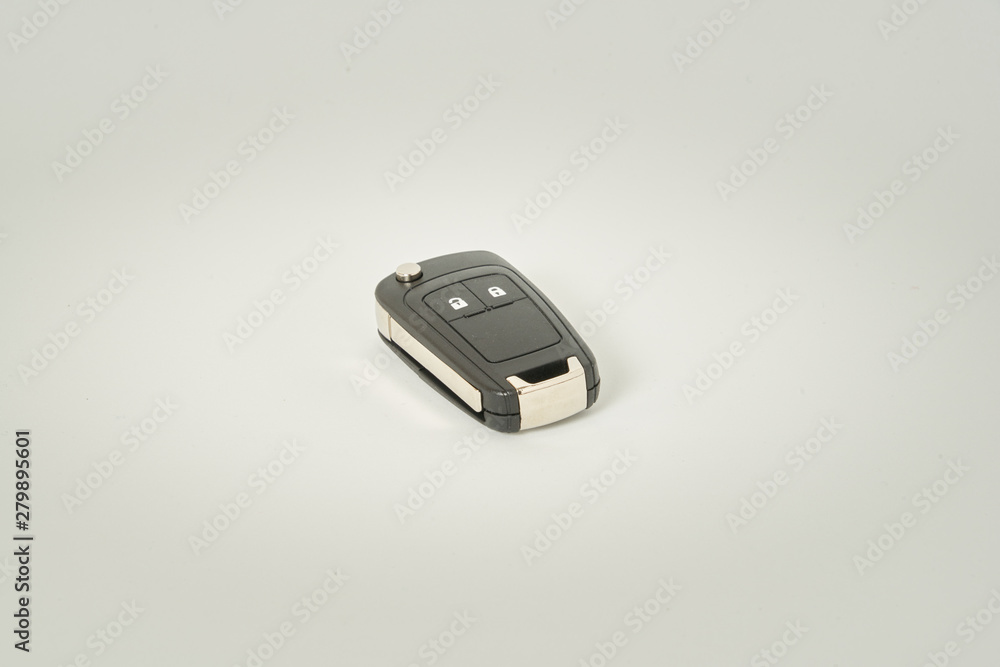 Car key on a white background. Perfect symbol to acquire a vehicle, to have property etc. Car key on a white background. Perfect symbol to acquire a vehicle, to have property etc.