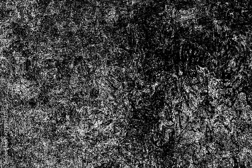 Dirty grunge background. The monochrome texture is old. Vintage worn pattern. The surface is covered with scratches.