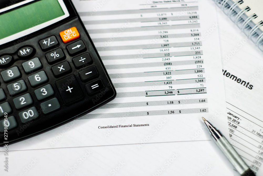 Finance savings concept, business equipment on paperwork. Finance savings concept, business equipment on paperwork.