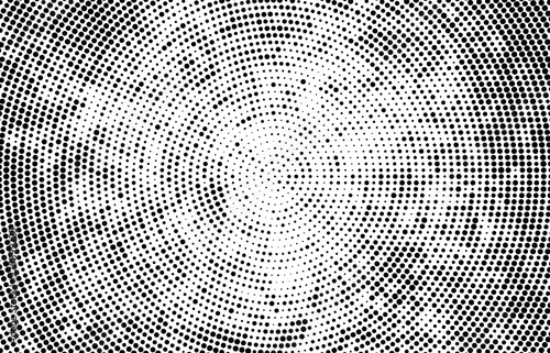 Abstract radial halftone texture. Monochrome background of black dots on white.