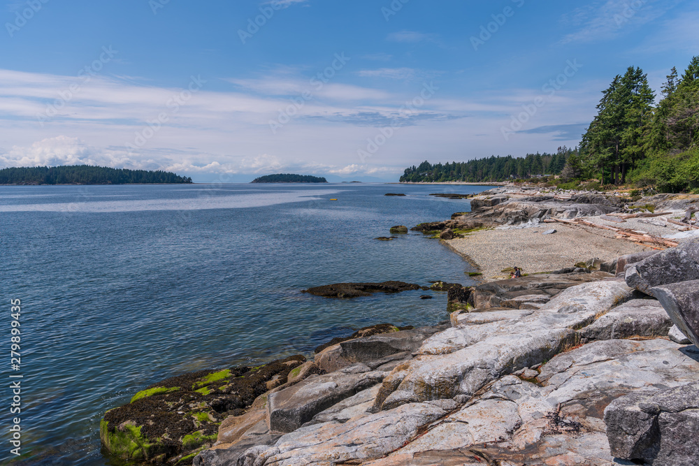 View over Inlet, ocean and island with mountains in beautiful British Columbia. Canada.