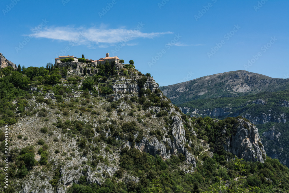 Naklejka premium View of mountain top village Gourdon in Provence, France. Gourdon is listed under the most beautiful villages of France.