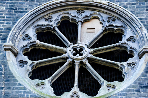 A rare example of a naturalistic ten-part rose window in Abney Park Cemetery church. The church is the oldest non denominational church in Europe and one of London s magnificent seven graveyards.