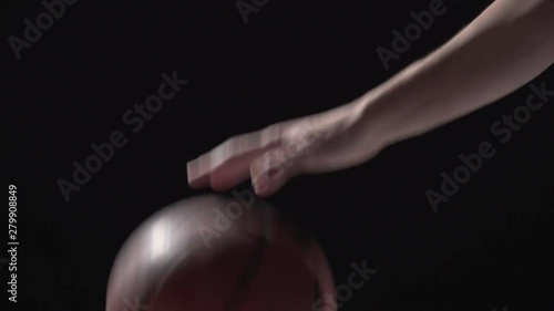 Basketball dribbled in slow motion, close up