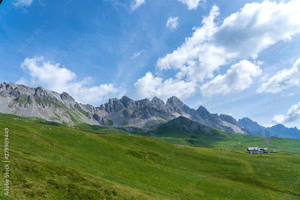 San Pellegrino Pass, Moena , Trentino Alto Adige, Alps, Dolomites, Italy: Landscape at the San Pellegrino Pass (1918 m).It's a high mountain pass in the Italian Dolomites. Summer landscape in the Alps