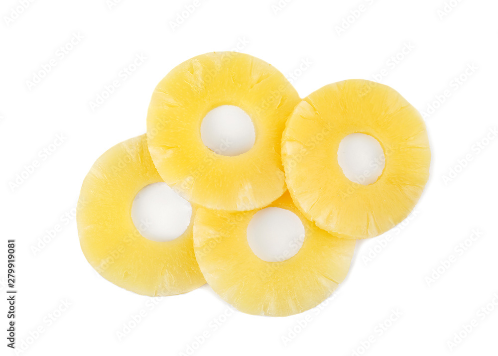 Slices of delicious sweet canned pineapple on white background, top view Slices of delicious sweet canned pineapple on white background, top view
