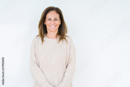 Beautiful middle age woman over isolated background with a happy and cool smile on face. Lucky person. © Krakenimages.com
