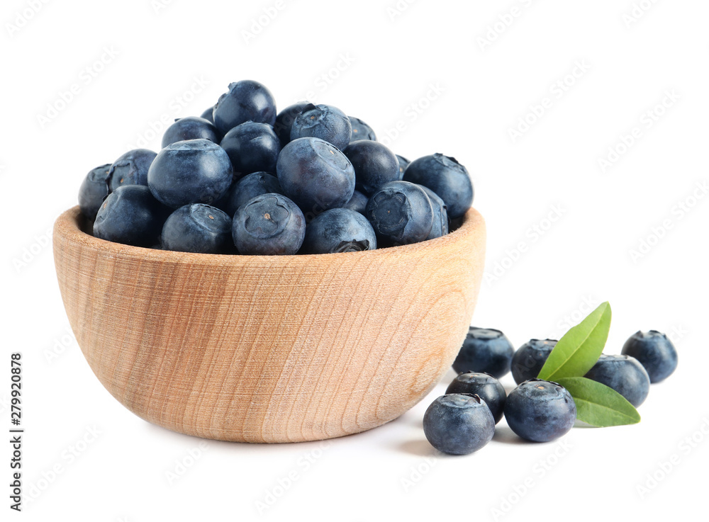Bowl of fresh raw blueberries with leaves isolated on white Bowl of fresh raw blueberries with leaves isolated on white