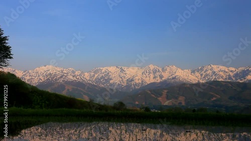 Zoom out shot of Japanese Alps in morning, Hakuba, Kitaazumi, Nagano photo