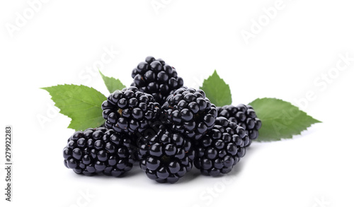 Pile of tasty ripe blackberries with green leaves on white background