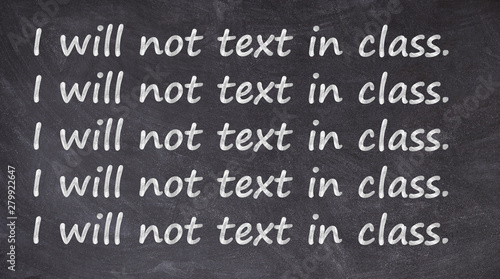 I will not text in class written on blackboard