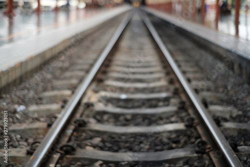Blurred of railway tracks at train station,abstract for background