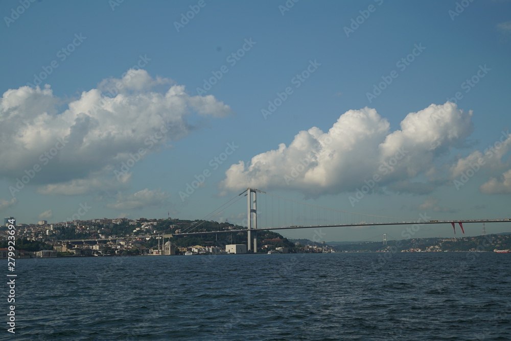 Istanbul Bosphorus skyline in cloudy weather. bridge and silhouette of istanbul Istanbul Bosphorus skyline in cloudy weather. bridge and silhouette of istanbul