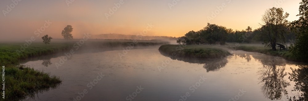 Morning Mist Sunrise Over River with a Cloudless Sky