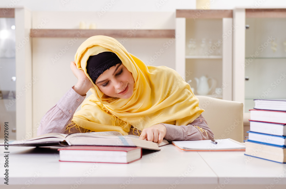 Female student in hijab preparing for exams Female student in hijab preparing for exams
