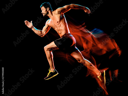 one caucasian topless muscular mature man runner. running jogger jogging isolated on black background with light painting speed mouvement effect © snaptitude