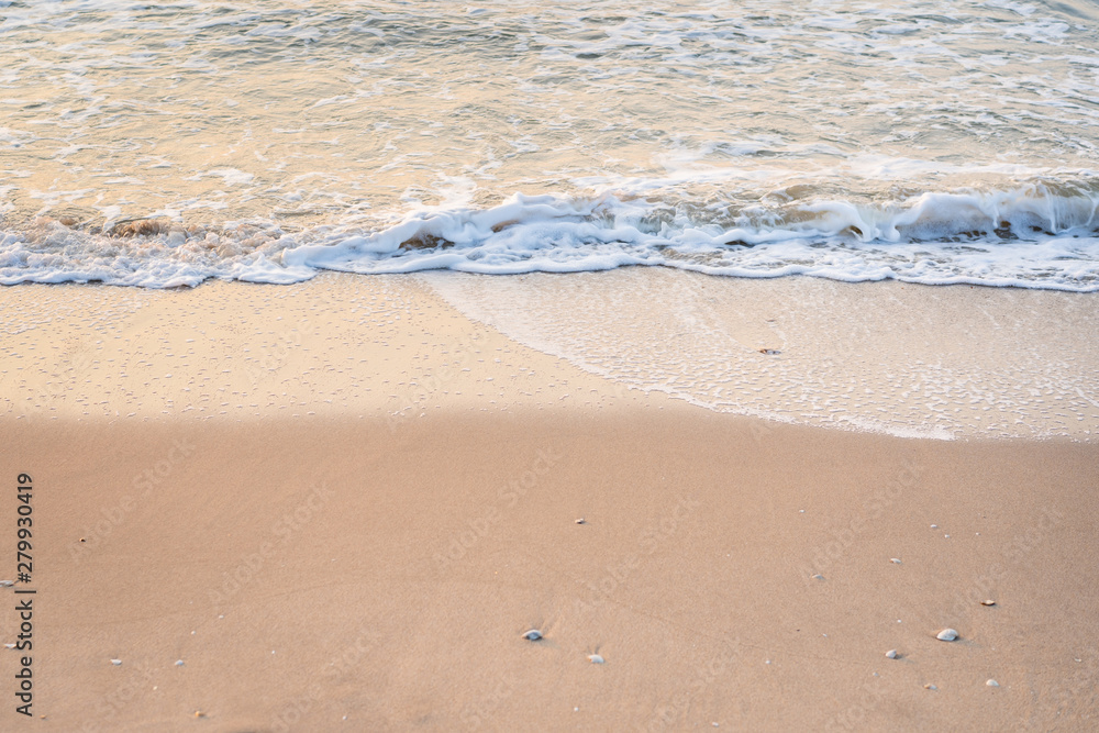 Smooth sandy at the beach and beautiful wave in background. Smooth sandy at the beach and beautiful wave in background.