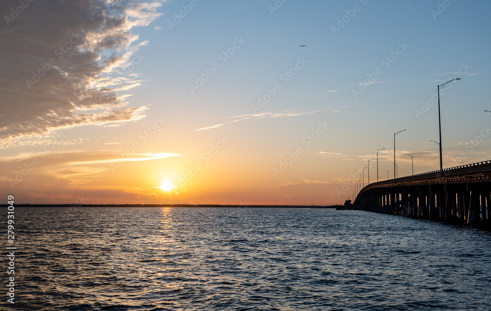 Sunrise of the Tampa Bay in Florida near a bridge.