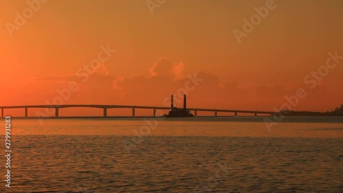 Hamahiga Bridge at sunrise, Uruma, Okinawa, Japan photo