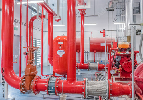 Typical installation of fire pump room with approved pump nd valve connect to pipe with stainless flexible pipe.