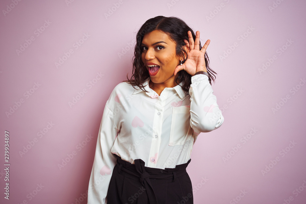 Transsexual transgender businesswoman standing over isolated pink background smiling with hand over ear listening an hearing to rumor or gossip. Deafness concept. Transsexual transgender businesswoman standing over isolated pink background smiling with hand over ear listening an hearing to rumor or gossip. Deafness concept.