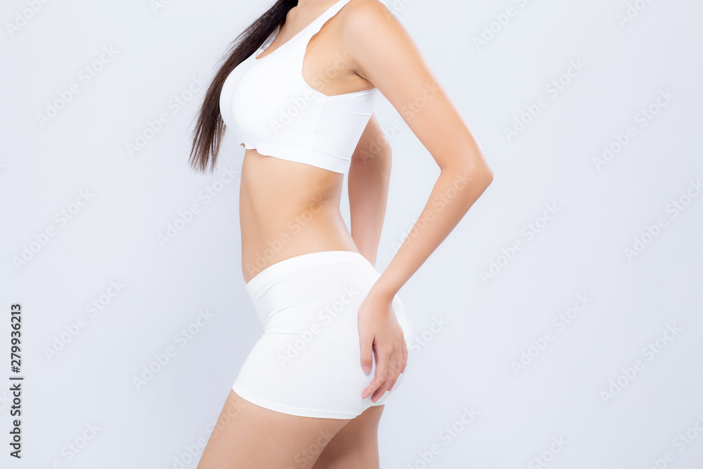 Closeup asian woman beautiful body diet with fit and hand touch bottom isolated on white background, model girl weight slim and butt with cellulite or calories, health and wellness concept.