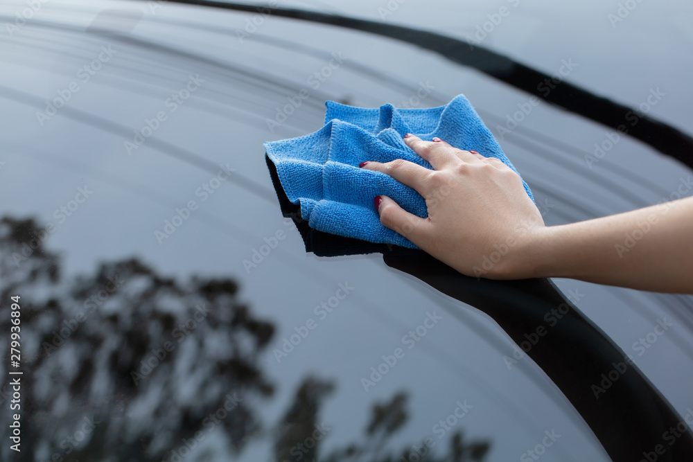 hand cleaning car using microfiber cloth - obrazy, fototapety, plakaty 