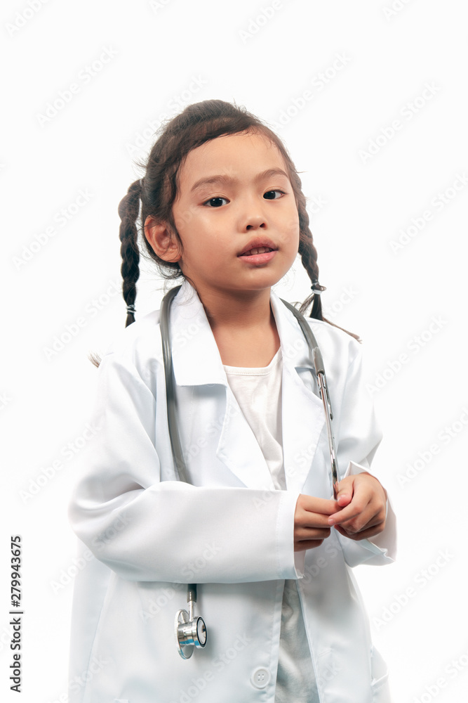 portrait of asian child girl playing roleplay being a doctor in lab coat with stethoscope portrait of asian child girl playing roleplay being a doctor in lab coat with stethoscope