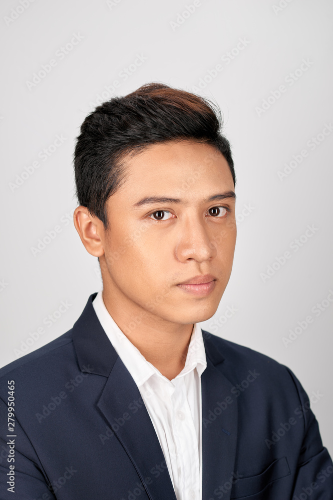 Portrait of serious businessman in suite on white background Portrait of serious businessman in suite on white background