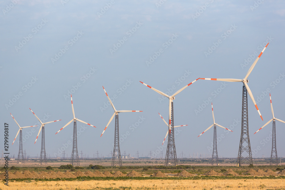Fototapeta premium Wind generators in the background in Azerbaijan. Nature ecology concept.