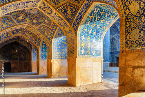 Beautiful vaulted arch passageway at the Shah Mosque in Isfahan photo