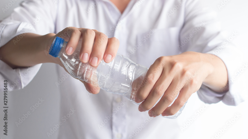 Two hand twisting plastic bottle isolated on white background, Global warming solution, Environment concept
