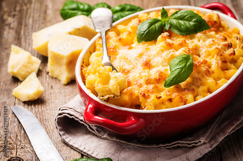 Mac and cheese, american style macaroni pasta in cheesy sauce photo