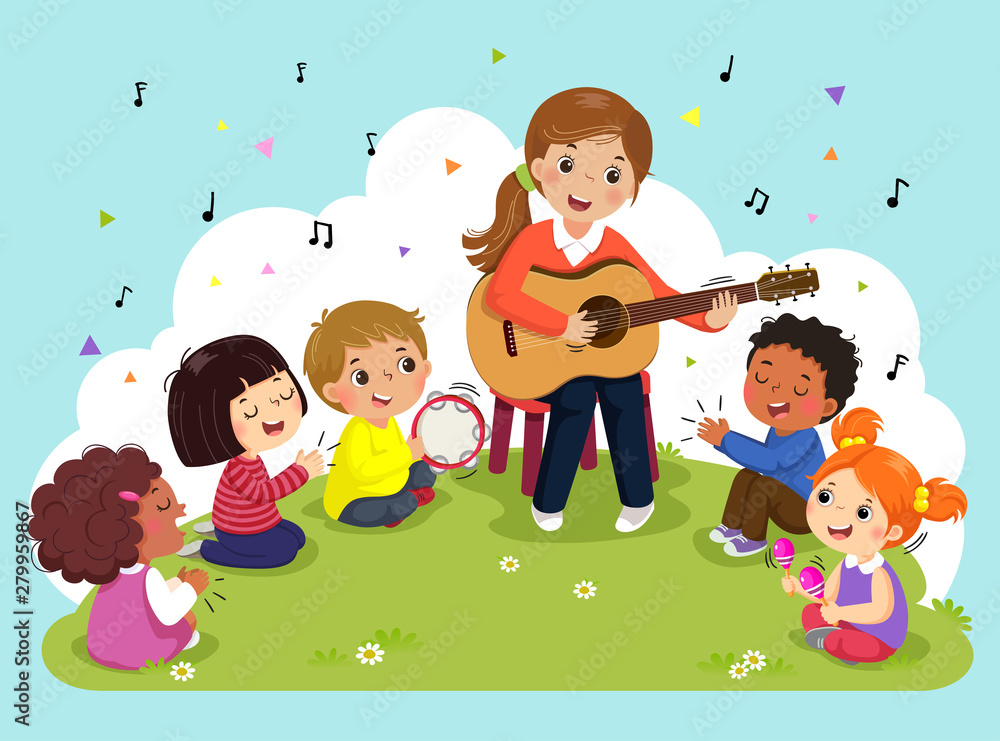 Young woman playing guitar with a group of kids singing and playing musical instruments. Female teacher and pupils having music in the park. Young woman playing guitar with a group of kids singing and playing musical instruments. Female teacher and pupils having music in the park.