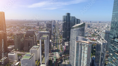 Aerial city view of Bangkok downtown, Flying over Bangkok, Thailand. © Punyawee