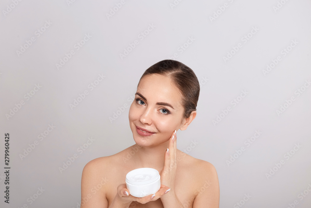 Skin Care. Woman With Natural Face Beauty Holding Facial Cream Skin Care. Woman With Natural Face Beauty Holding Facial Cream