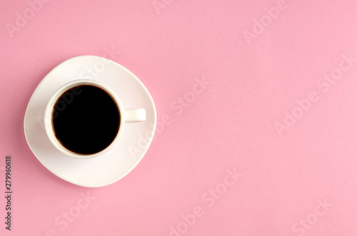 Coffee cup on pink background composition. Flat lay