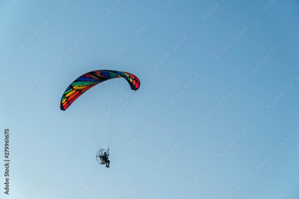 Paragliding at sunset with amazing view Paragliding at sunset with amazing view