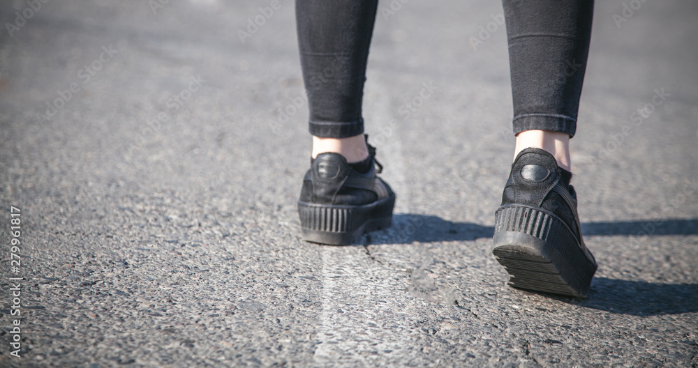 Woman with black stylish shoes in outdoor. Woman with black stylish shoes in outdoor.